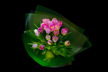 Bouquet of spring tulips on a black background