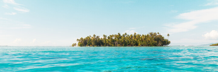 Beach paradise travel vacation view of tropical motu island idyllic crystalline turquoise ocean in...