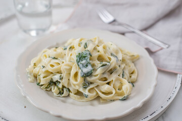 tagliatelle pasta with a creamy wild garlic sauce