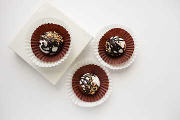 gift box on a white background and chocolate candies. white background