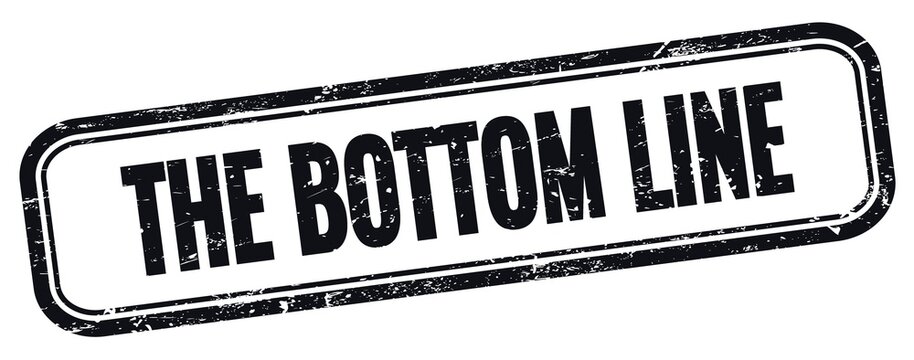 THE BOTTOM LINE text on black grungy vintage stamp.
