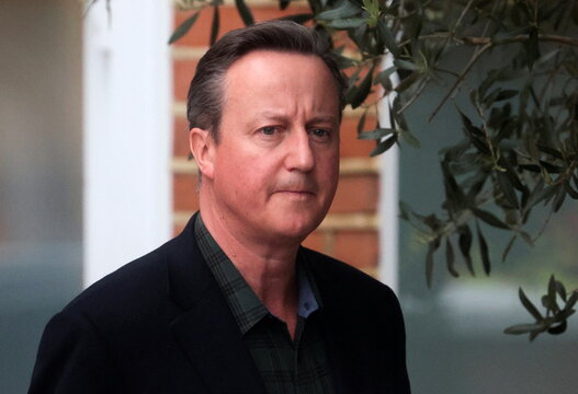 Former British Prime Minister David Cameron leaves his home in London