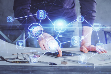 Double exposure of man's hands holding and using a phone and social network theme drawing.