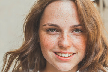 Woman freckles skin beauty natural make up portrait casual happy smile - obrazy, fototapety, plakaty