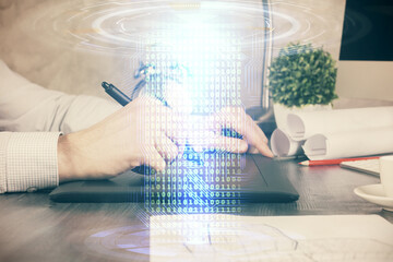 Fototapeta premium Multi exposure of man's hands holding and using a digital device and data theme drawing. Innovation concept.