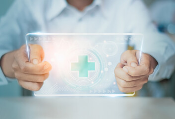 Blurred-doctor hand holding modern medical visual interface equipment,medical network health care online connection,concept business and medicine with profit,benefit,health and insurance for patients