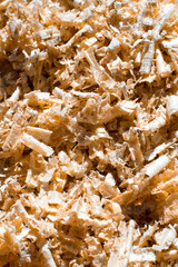 Wood shavings, textured background of sawdust.