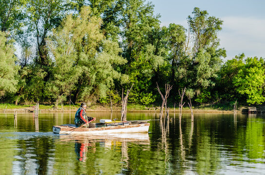 Novi Sad, Serbia - May 05. 2021: Recreational, traditional, sports, fishing on a sunny day, on the waters of the Danube tributary near Novi Sad, Serbia. 