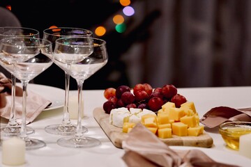 glasses of champagne on a table in a black background