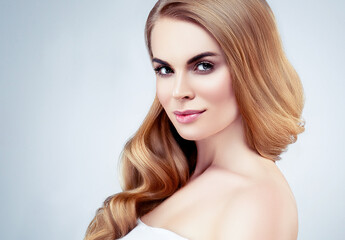 Naklejka premium Beautiful woman with long healthy blonde hair beauty skin perfect eye lashes