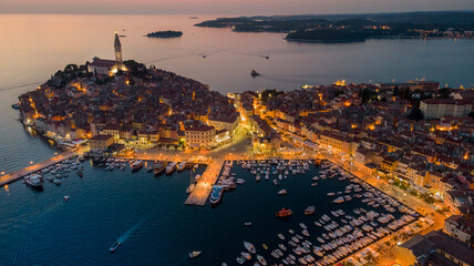 Aerial view of Istrian Town Rovinj, Croatia just after the sunset. Church of St. Euphemia on the...