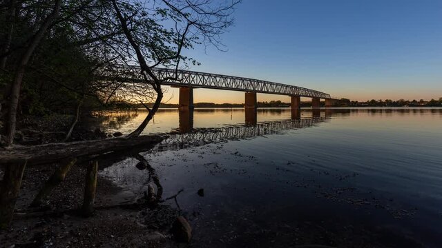 Time Lapse of the old little belt bridge linking the island Fyn (Funen) with Jutland in Denmark. The bridge has been in use since 1935