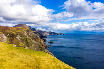 Aerial view of the beautiful coast at Malin Beg with Slieve League in the background in County...