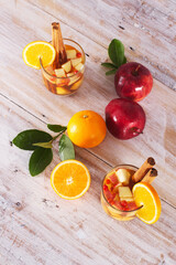Cocktail drink-orange juice fresh juice with strawberry with lemon orange, mango, pineapple, apple, grapes isolated on white background. High-resolution image