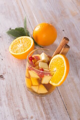 Cocktail drink-orange juice fresh juice with strawberry with lemon orange, mango, pineapple, apple, grapes isolated on white background. High-resolution image