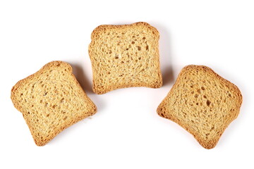 Fototapeta na wymiar Three wholemeal crackers, bread rusks pile, toast slices isolated on white background, top view