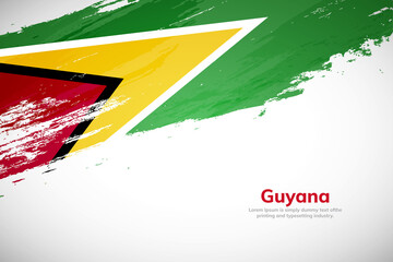 Brush painted grunge flag of Guyana country. Hand drawn flag style of Guyana. Creative brush stroke concept background