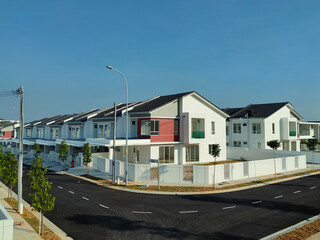 SEREMBAN, MALAYSIA -APRIL 20, 2021: New double story luxury terrace house in Malaysia.  Construction almost completed. Designed by an architect with a modern and contemporary style. 