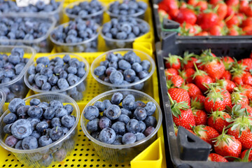 Blueberries and strawberries at farmer market