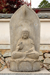 Stone statue of Shakyamuni (Gautama Buddha) at Taifuku-ji temple in Kobe, Hyogo, Japan
