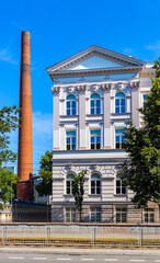 South wing of historic building of Warsaw Polytechnics technical university with vintage chimney in Srodmiescie city center district of Warsaw, Poland - obrazy, fototapety, plakaty