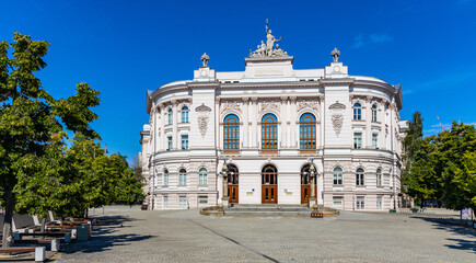 Main historic building of Warsaw Polytechnics - Politechnika Warszawska - technical university in Srodmiescie city center district of Warsaw, Poland - obrazy, fototapety, plakaty