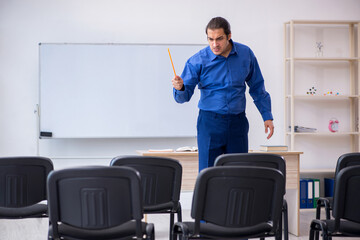 Young male business trainer making presentation during pandemic