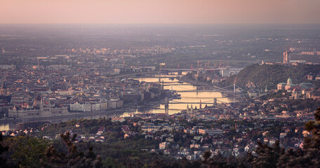 Fototapeta na wymiar View of Budapest with the River Danube and Bridges at dawn from Hármashatárhegy