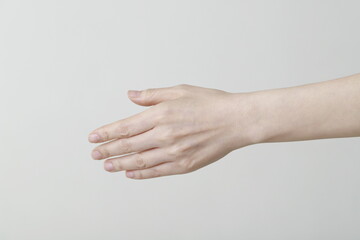 Fototapeta na wymiar Close up of woman hand offering handshake