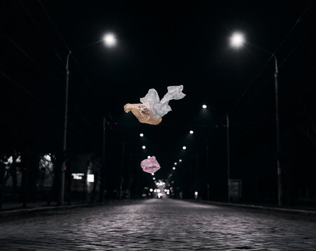 Garbage flies over the night city