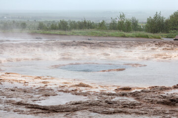 Strokkur geyser before discharging water, Iceland