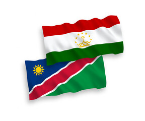 Flags of Republic of Namibia and Tajikistan on a white background