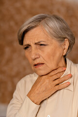 Fototapeta premium Close up portrait of sad senior woman