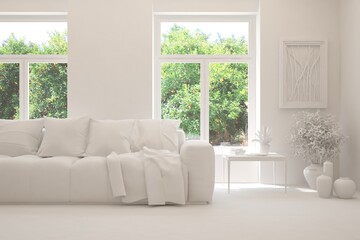 Mock up of stylish room in white color with sofa and green landscape in window. Scandinavian interior design. 3D illustration