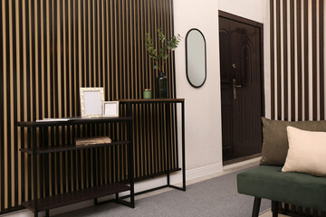 Modern hallway interior with console table and mirror