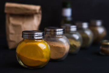 easonings for cooking, spoons with seasonings, jars with seasonings