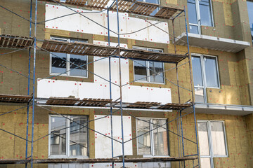 Fototapeta na wymiar scaffolding, building construction site, industry work process