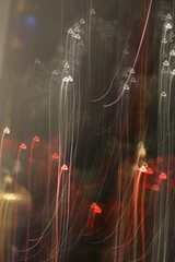 abstract long exposure light streaks with a Christmassy feel suitable for a background