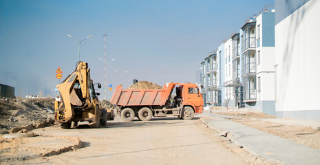 some machines on the construction site, working and building process