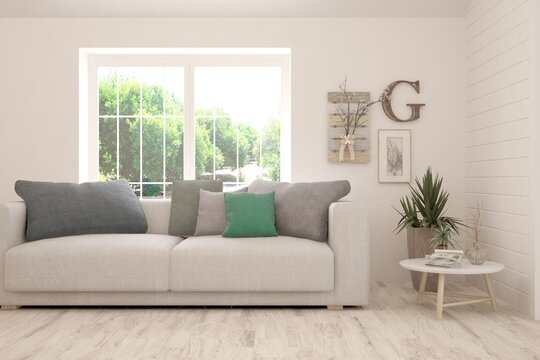 Minimalist living room in white color with sofa and summer landscape in window. Scandinavian interior design. 3D illustration