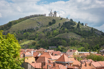 Fototapeta na wymiar Holy Hill and roofscape of Mikulov, South Moravia, Czech Republic