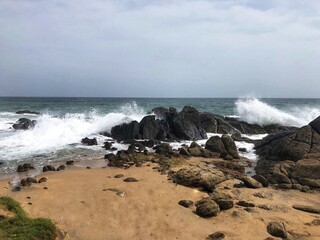 waves crashing on rocks
