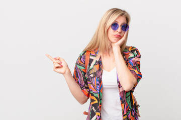 young blonde woman feeling bored, frustrated and sleepy after a tiresome. summer concept