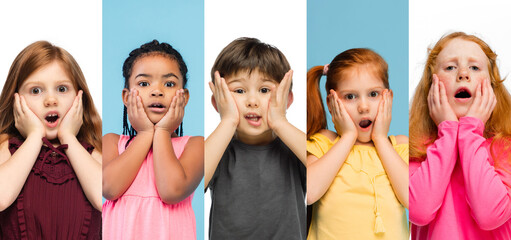 Art collage made of portraits of little and happy kids isolated on multicolored studio background. Human emotions, facial expression concept