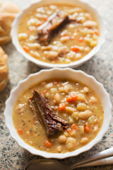 Bean soup with vegetables and bacon