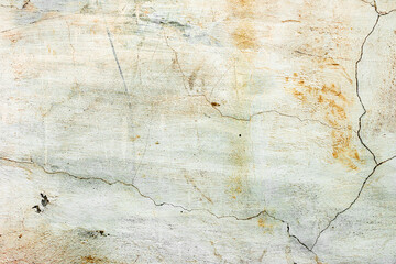 Texture of a concrete wall with cracks and scratches which can be used as a background