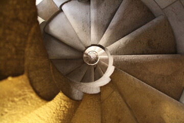 underside of a spiraling stair case in a tower