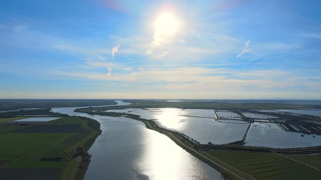 Flying over the Po river in the Po Delta Italy