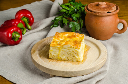 Cheese puff pie from unleavened dough. Georgian cuisine - khachapuri Achma