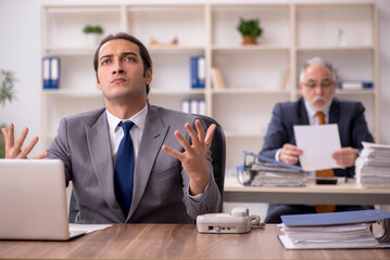 Two employees in bullying concept